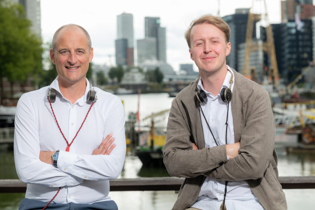 Modern marconists wearing vintage headphones