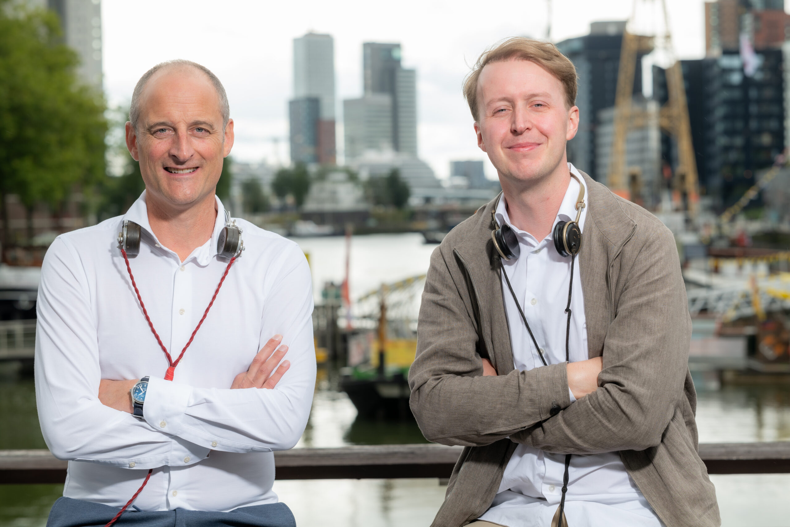 Modern marconists wearing vintage headphones